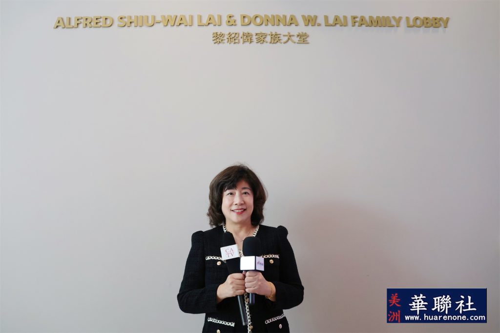 Cynthia Lau speaking with media at the Lai Family Lobby plaque